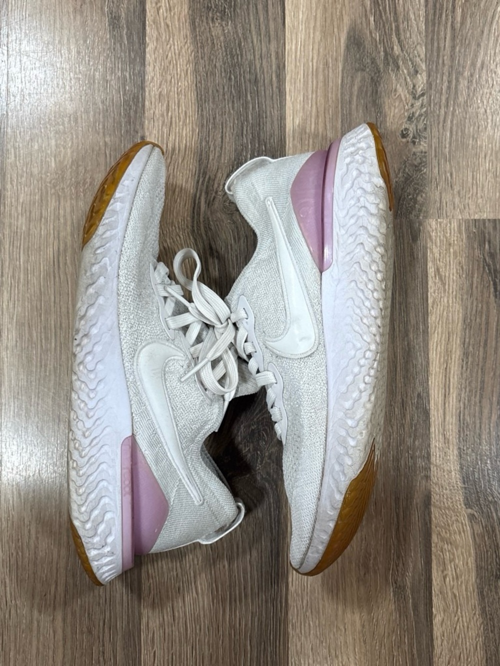 Nike Women's White Knit Sneakers with Pink Heel Accent